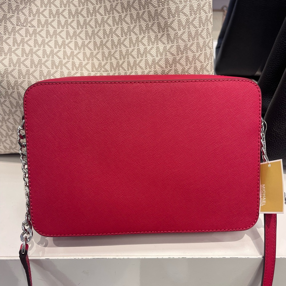 MICHAEL KORS Jet Set Lg Saffiano Leather EWCrossbody Bag East Wes
Dark Raspberry - Picture 12 of 16